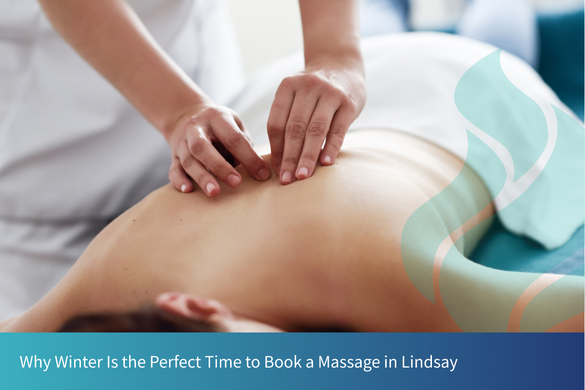 A woman lying on a table recieves a back massage. Why winter is the perfect time to book a massage in Lindsay.