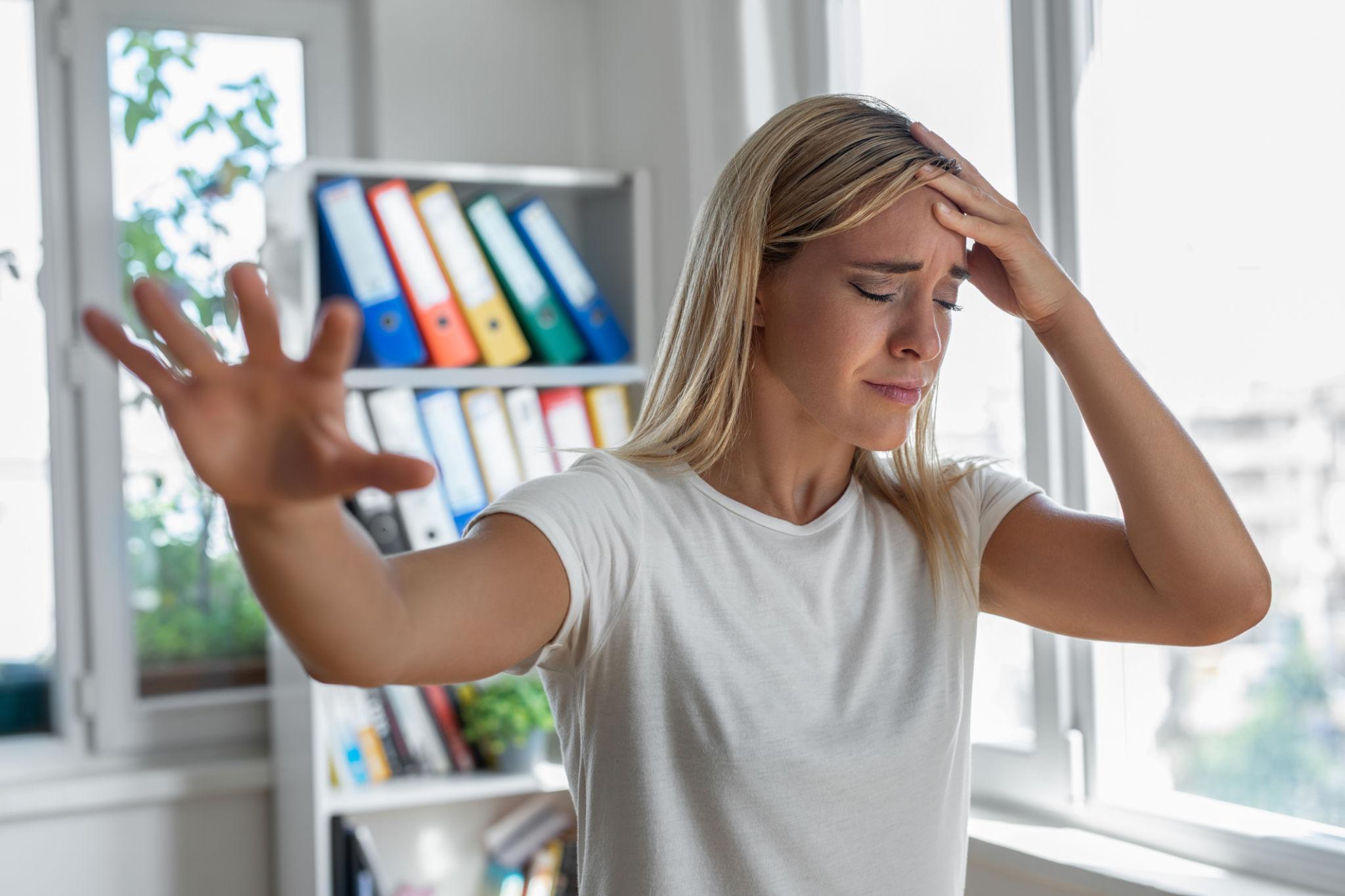 Physiotherapist performing Epley maneuver to treat positional vertigo